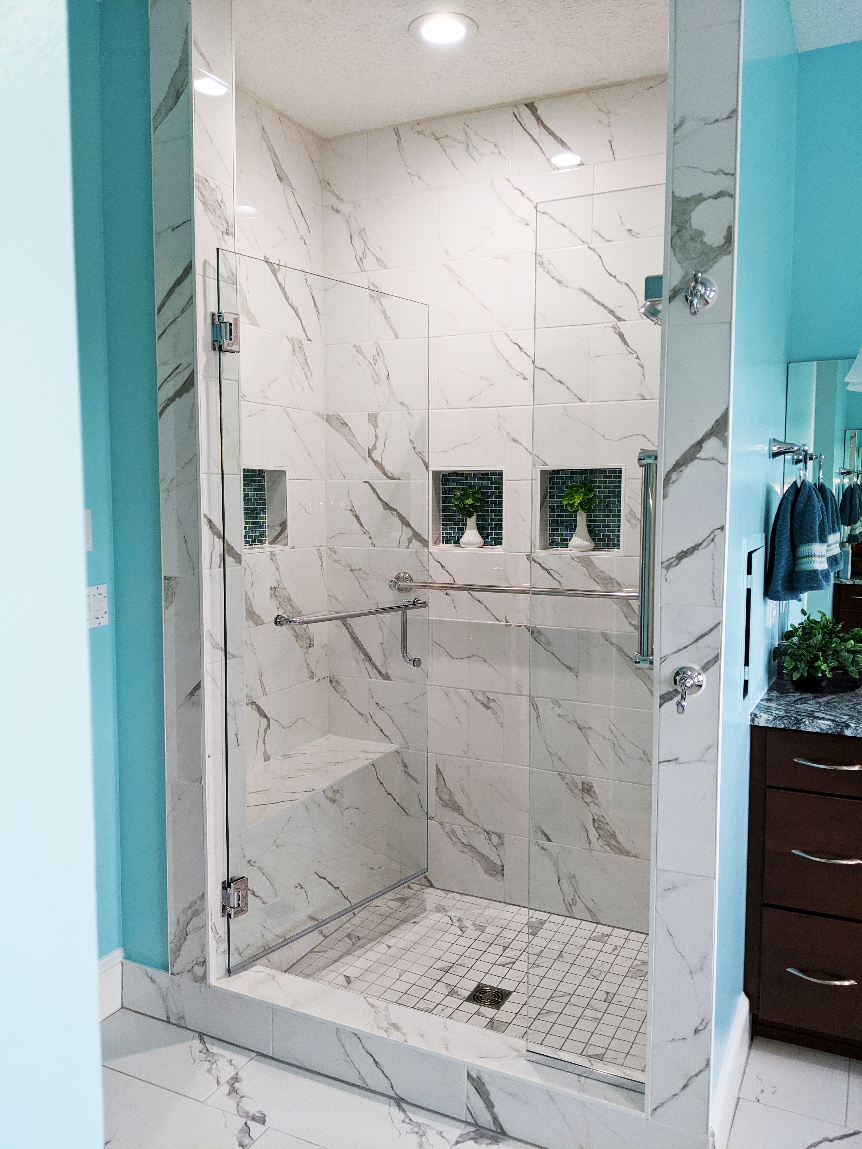 White marble tile shower bathroom | Dehart Tile