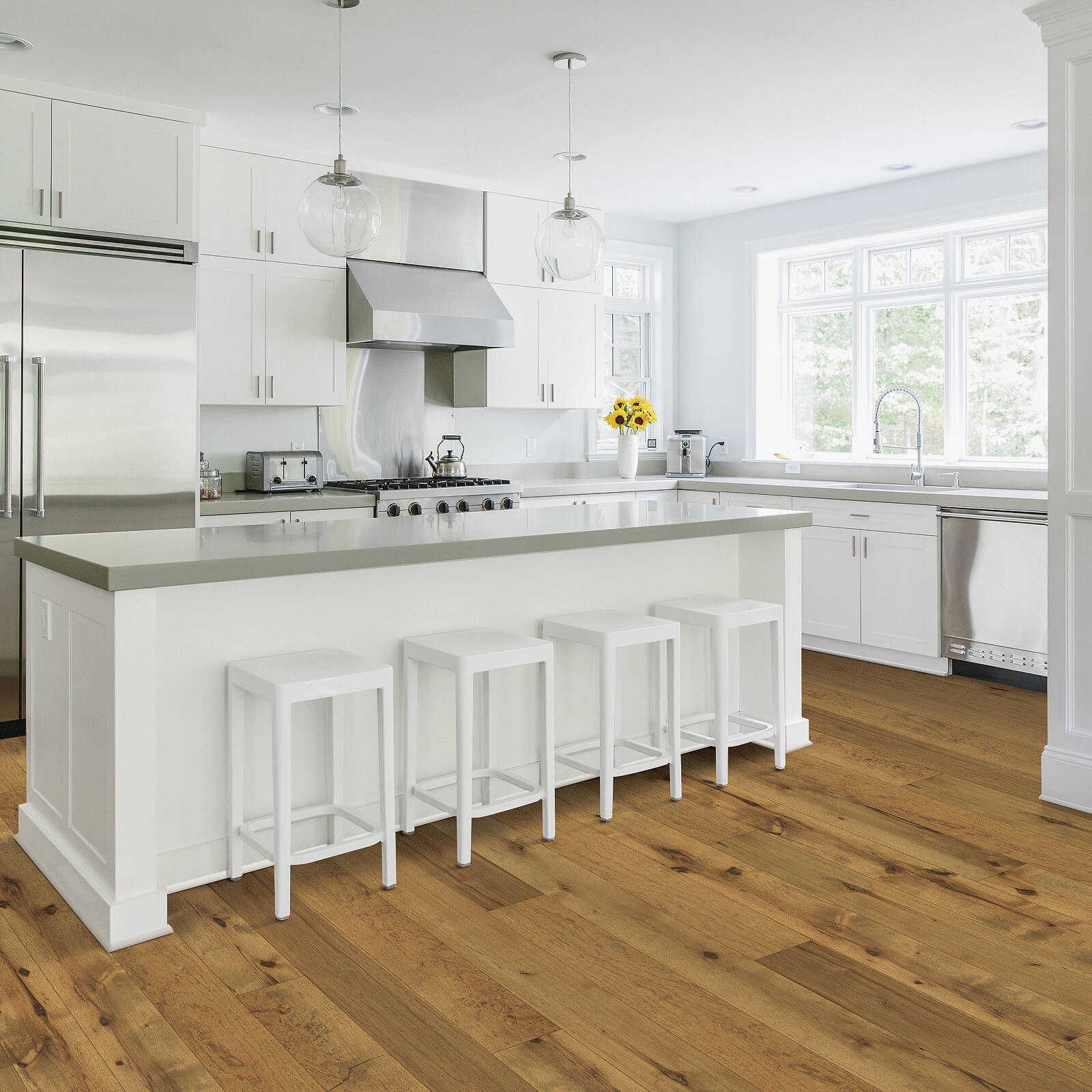 Hardwood flooring in kitchen | Dehart Tile